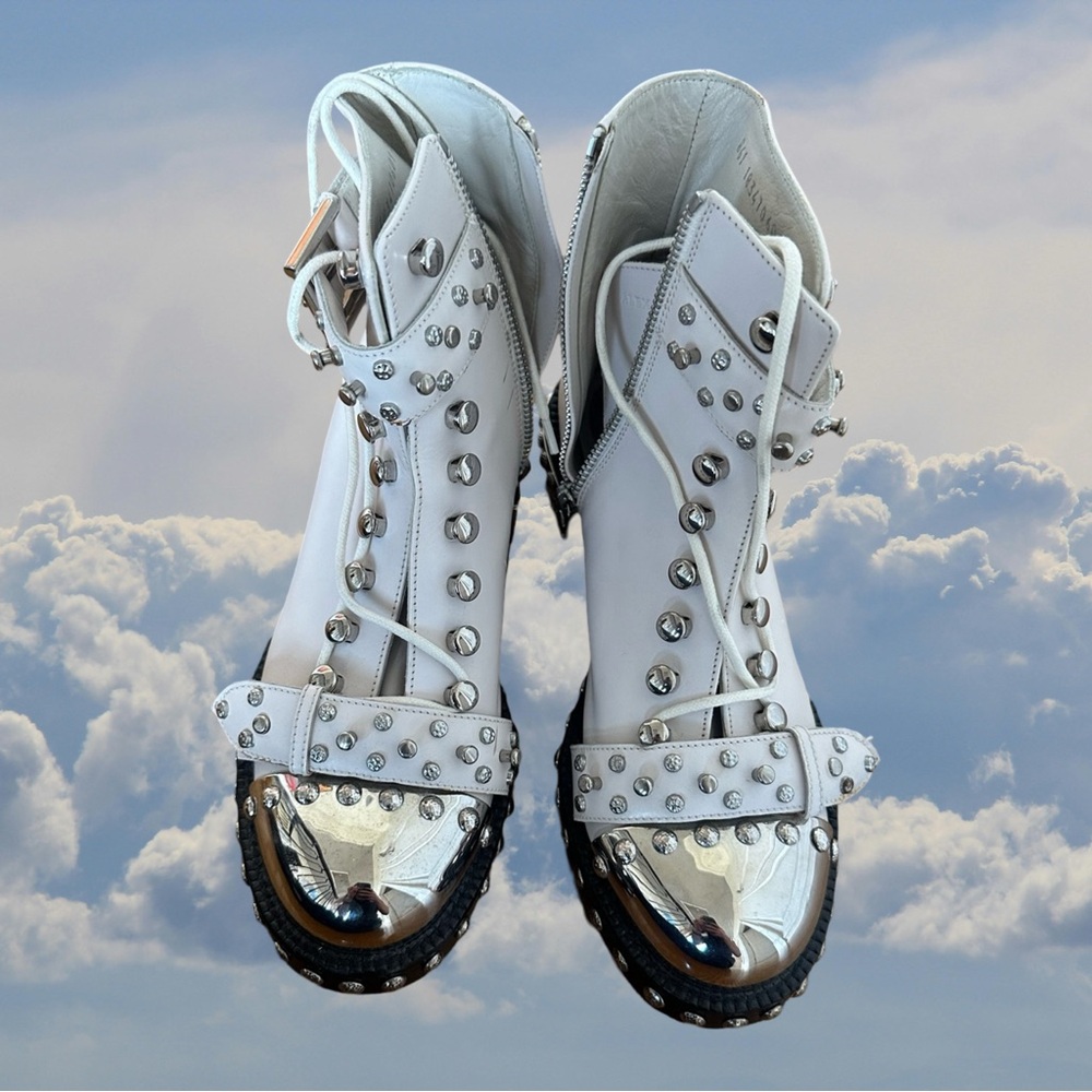 Alexander McQueen white leather studded boots 
so so cool and awesome